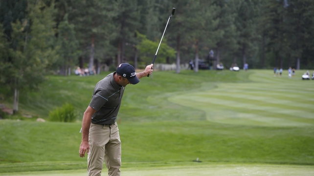 Geoff Ogilvy celebrates after making his final putt on the 18th hole to win the Barracuda Championship