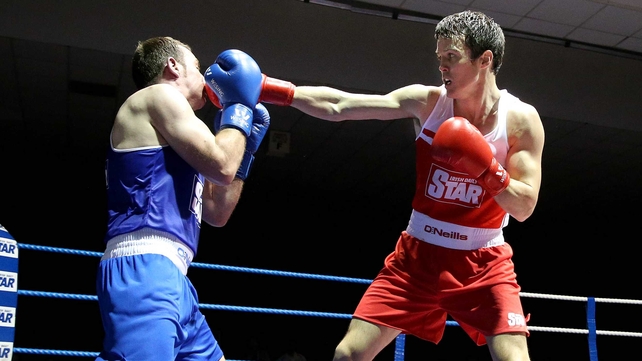 Darren O'Neill (red) fights in place of the injured Joe Ward