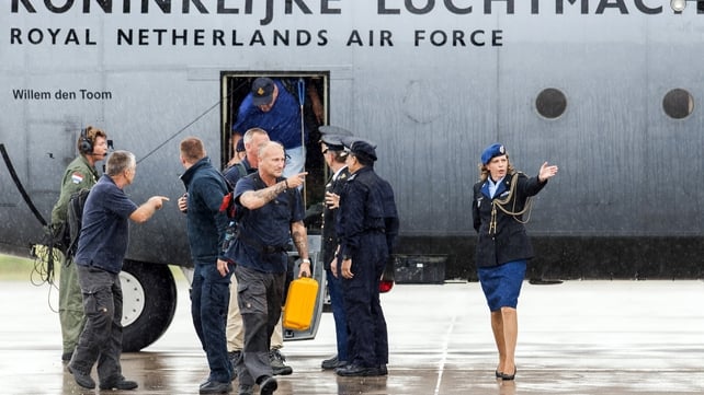 Members of the repatriation mission who were active in the area of the MH17 plane crash arrive at the Eindhoven airbase Members of the repatriation mission who were active in the area of the MH17 plane crash arrive at the Eindhoven airbase
