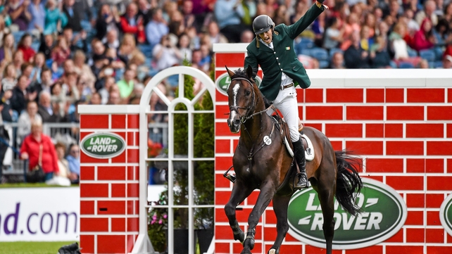 Michael Hutchinson on Acorad 3, celebrates after clearing the wall at 7 feet 3 inches