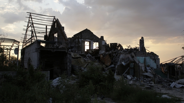 A house destroyed by fighting between Ukrainian armed forces and pro-Russian militants A house destroyed by fighting between Ukrainian armed forces and pro-Russian militants
