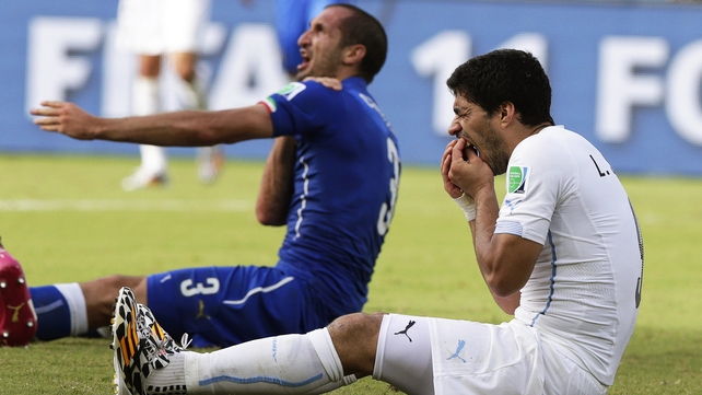 Luis Suarez was banned after biting Italian defender Giorgio Chiellini Luis Suarez was banned after biting Italian defender Giorgio Chiellini