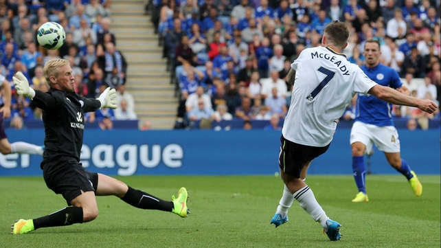 Aiden McGeady curls the ball bast Leicester 'keeper Casper Schmeichel to give Everton the lead