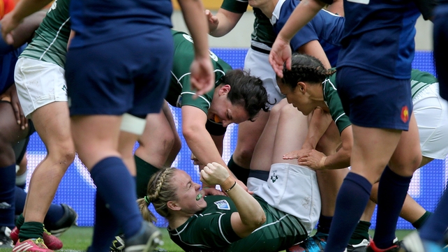 Niamh Briggs celebrates scoring Ireland's opening try