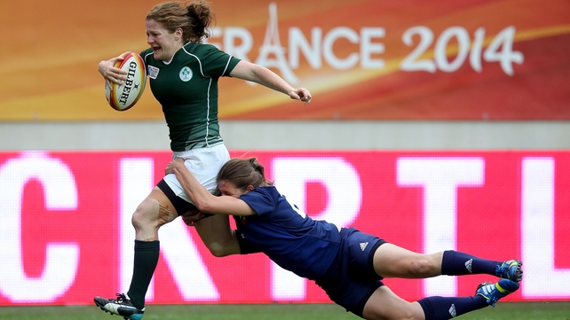 Grace Davitt beats Christelle Le Duff of France to score Ireland's second try