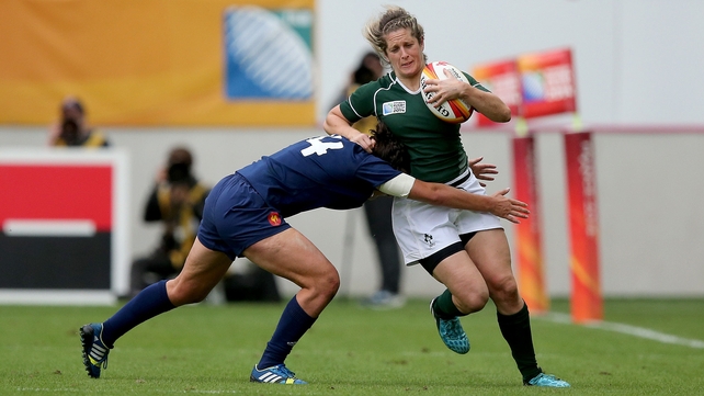 Alison Miller is tackled by France's Shannon Izar
