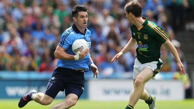 Michael Darragh Macauley in action againt Brian McMahon of Meath in the Leinster final