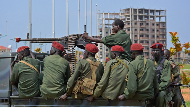 South Sudanese soldiers secure a road near the airport in Juba, South Sudan's capital South Sudanese soldiers secure a road near the airport in Juba, South Sudan's capital