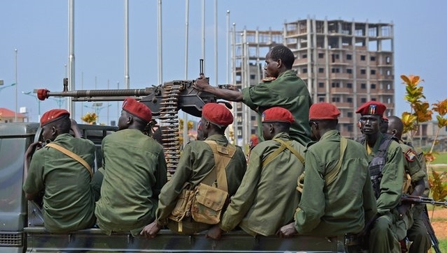 South Sudanese soldiers secure a road near the airport in Juba, South Sudan's capital South Sudanese soldiers secure a road near the airport in Juba, South Sudan's capital