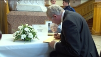 McGuinness signs Paisley book of condolence McGuinness signs Paisley book of condolence