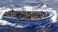 450 migrants on board ship with no crew off Italy 450 migrants on board ship with no crew off Italy
