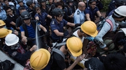 Hong Kong police charged protesters with batons and pepper spray