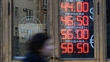 Rouble claws back on recent losses