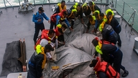 Bad weather hampers AirAsia search operation Bad weather hampers AirAsia search operation