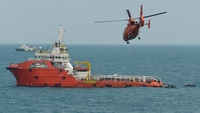 Search teams raise tail of crashed AirAsia plane Search teams raise tail of crashed AirAsia plane