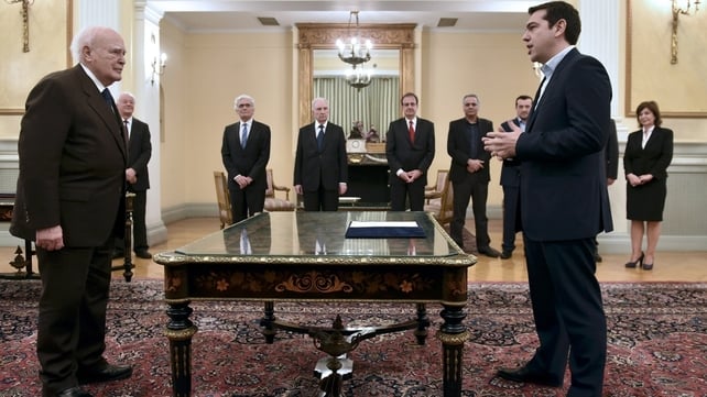 Alexis Tsipras (R) faces Greece's President Karolos Papoulias (L) as he is sworn in as Greek Prime Minister Alexis Tsipras (R) faces Greece's President Karolos Papoulias (L) as he is sworn in as Greek Prime Minister