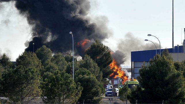 Smoke rises after the Greek F-16 aircraft crashed at Los Llanos air base in Albacete, eastern Spain Smoke rises after the Greek F-16 aircraft crashed at Los Llanos air base in Albacete, eastern Spain