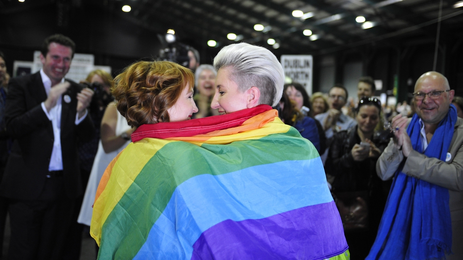 Monnine Griffith (L) and Clodagh Robinson celebrate after early results suggest an overwhelming majority in favour of the referendum on same-sex marriage,