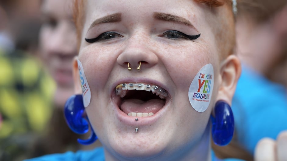 Supporters in favour of same-sex marriage celebrate and cheer as thousands gather in Dublin Castle square awaiting the referendum vote outcome