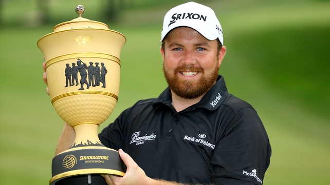 Shane Lowry holds WGC-Bridgestone trophy