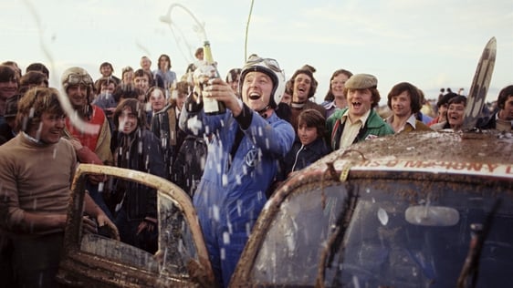Mike Murphy celebrates with members of Ballinhassig Hot Rod Racing Club (1977)