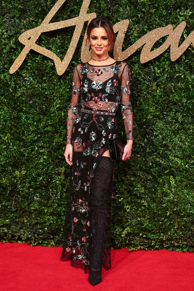 This sheer embroidered dress and thigh boots combo from Topshop is perfect on the mesmerizing singer at the British Fashion Awards in 2015.