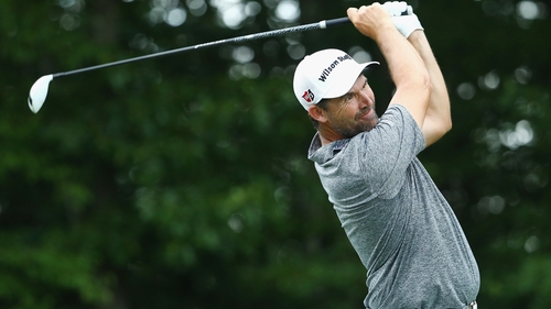Spieth holds lead in windy Travelers