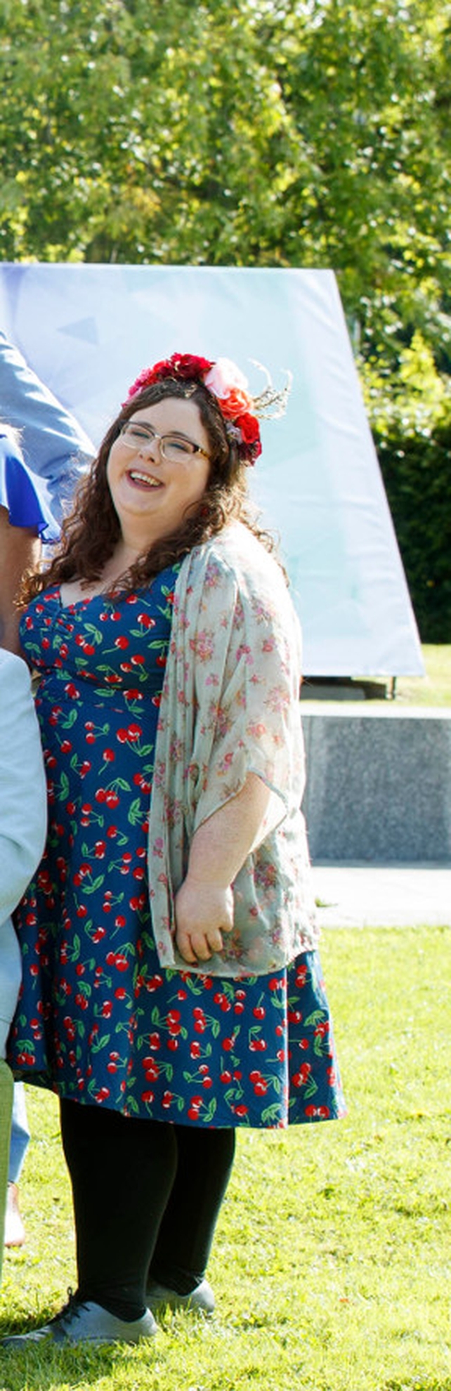 Alison Spittle loves funky patterns like this cherry patterned dress and floral cardigan. And she's a fan of flower crowns (who isn't?) this one is from Claire's Accessories. #love