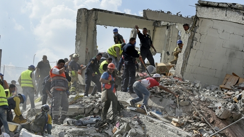 At least 100 dead after powerful earthquake hits Mexico At least 100 dead after powerful earthquake hits Mexico