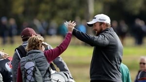 Lowry congratulated by spectator after his hole in one on the 5th hole Lowry congratulated by spectator after his hole in one on the 5th hole