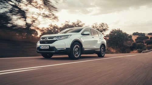 Honda's new CR-V is described as an electric car with a petrol engine. Honda's new CR-V is described as an electric car with a petrol engine.