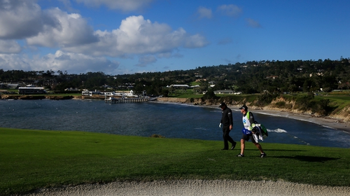 Mickelson leads as play suspended at Pebble Beach