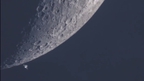 Amateur astronomer captures ISS gliding by the moon