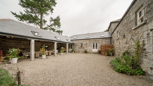 Irish couple turn three farmyard barns into stunning family home Irish couple turn three farmyard barns into stunning family home