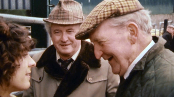 Doireann Ní Bhriain speaks to farmers at the Mullingar Mart in County Westmeath, 1983.