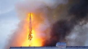 Watch: Fire topples spire at historic Copenhagen building