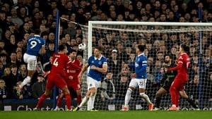 Liverpool's title hopes wither in rare derby defeat