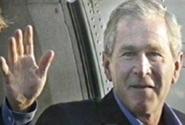 George W Bush - Plaster on hand, graze on chin