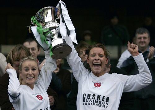 Tara Nevin and Mairead Nixon lift the cup for Dundalk City