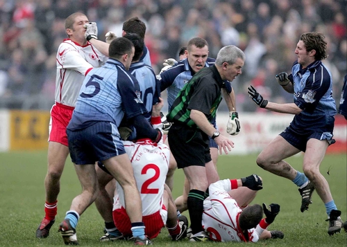 Nine players have been charged following the fracas that marred the Dublin and Tyrone game