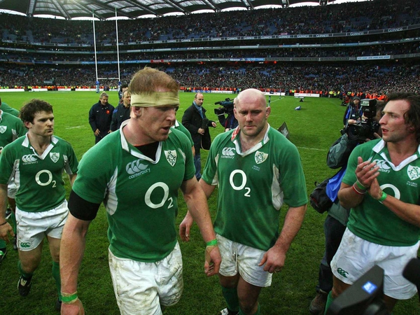 Irish players leave the pitch dejected after the loss to France