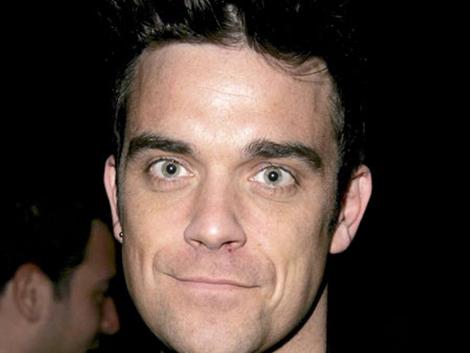 Robbie Williams checks into rehab clinic