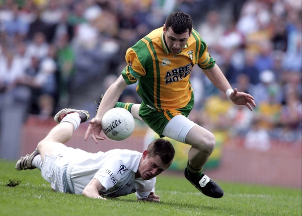 Donegal's Ciaran Bonner strides away from Kildare's Emmet Bolton in the NFL semi-final in Croke Park