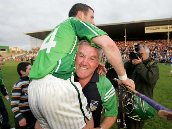 Richie Bennis holds Andrew O'Shaughnessy aloft following Limerick's draw with Tipperary