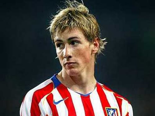 Spanish footballer Fernando Torres of Liverpool FC, holding a signed  News Photo - Getty Images