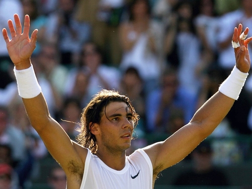 Nadal survives epic tiebreak to power into quarters