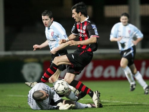 Derry goalkeeper Gerard Doherty saves at the feet of Killian Brennan