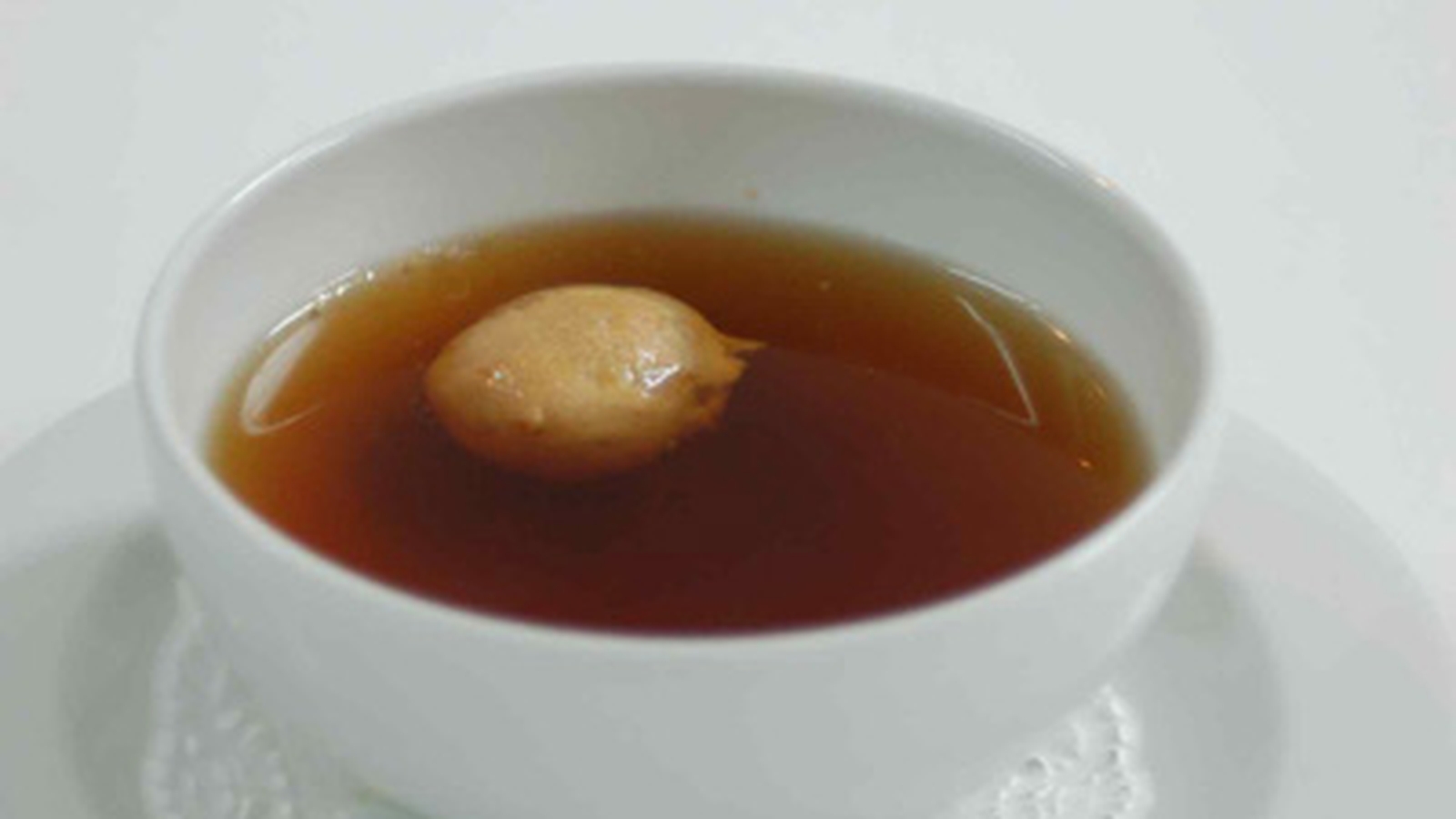 Beef Consommé With Foie Gras Profiteroles