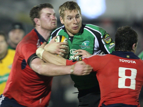 Gavin Duffy tackled by Donnacha Ryan and David Wallace of Munster during Connacht's historic win