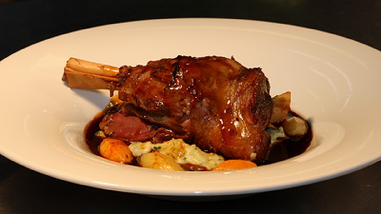 Slow Braised Lamb Shanks on a bed of Colcannon Mas